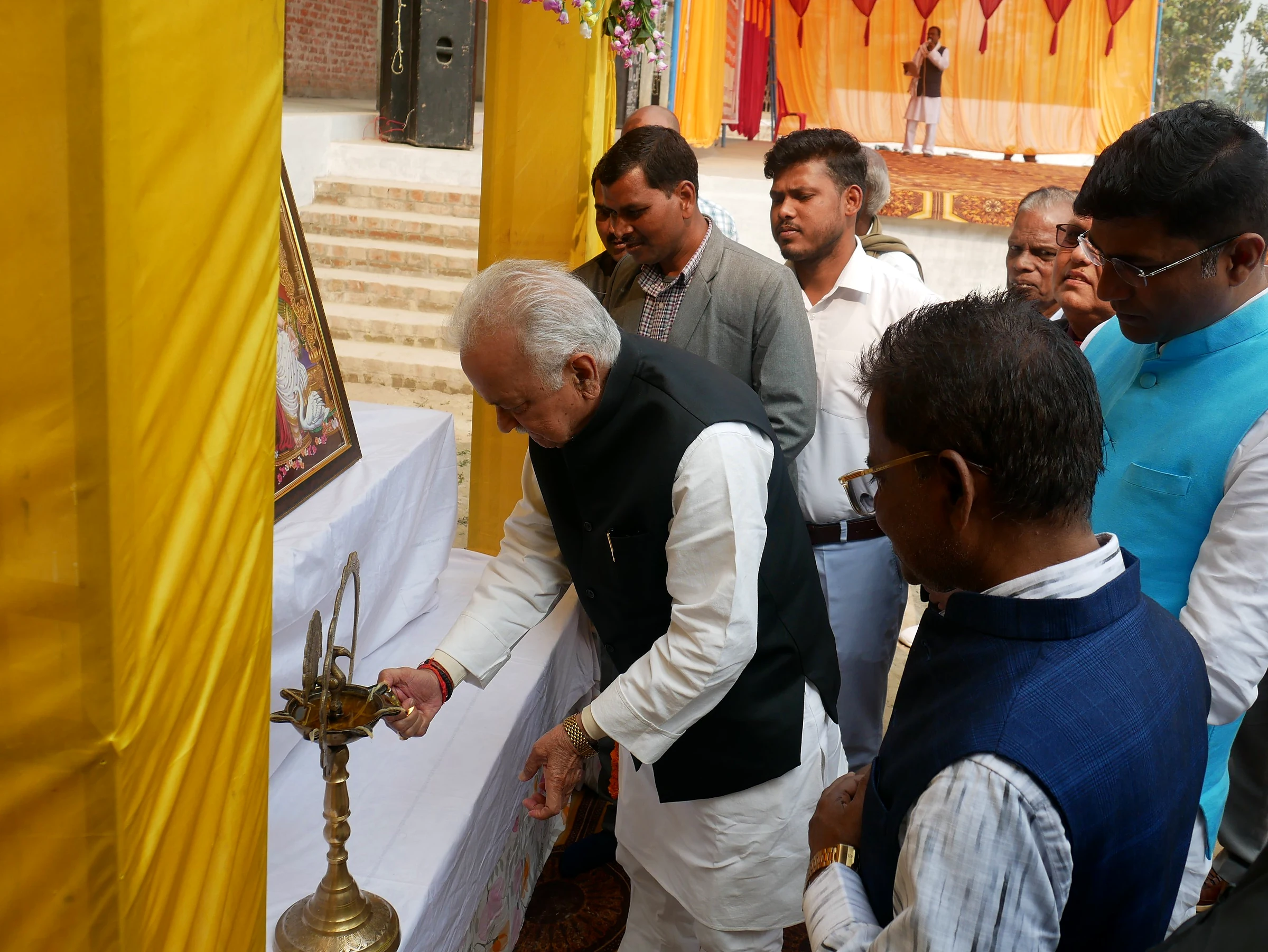 A ceremonial lamp-lighting at a school programme
