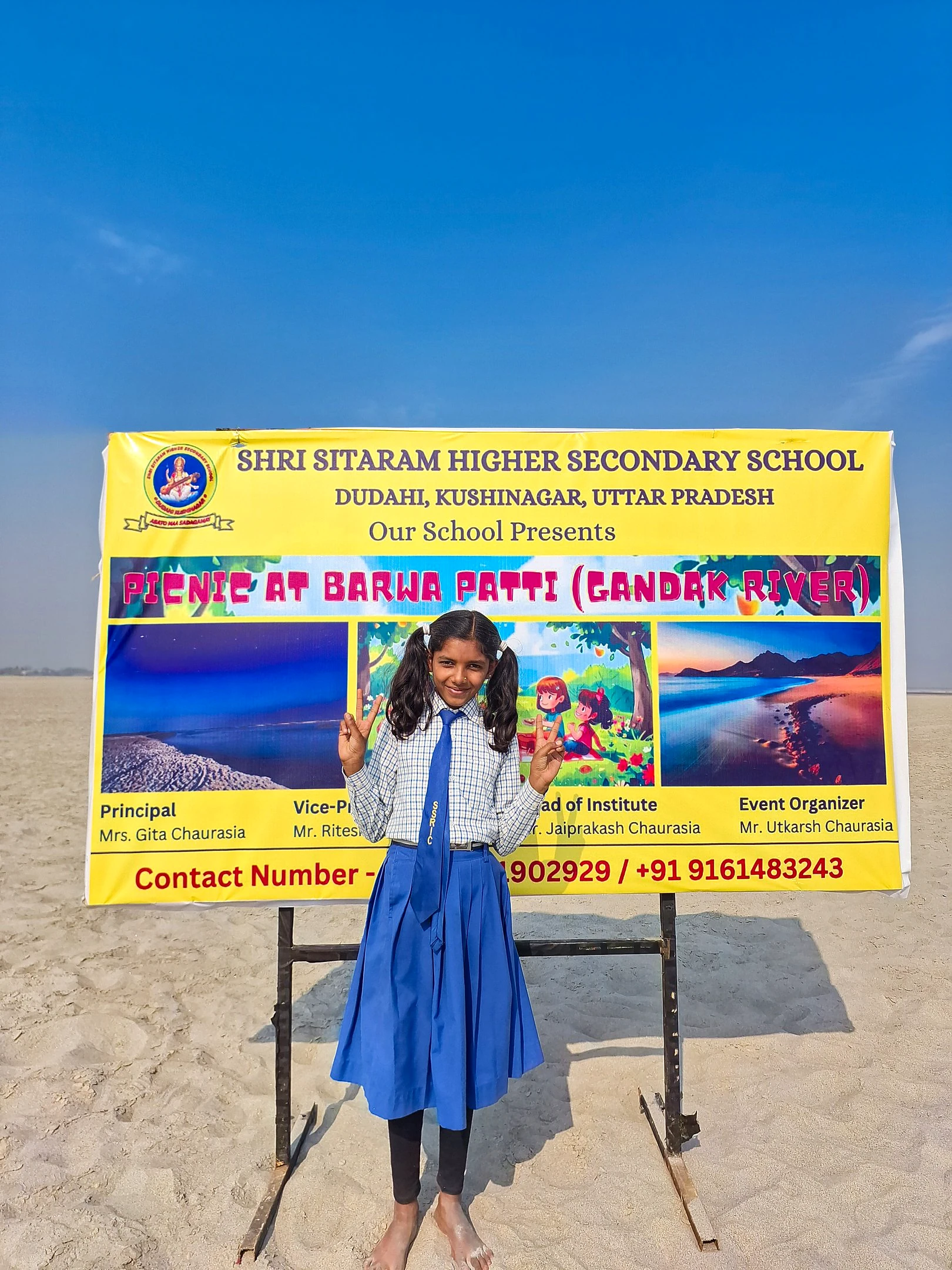 A student presenting a Chandrayaan mission display
